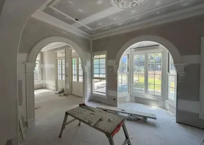 Decorative ceiling panels and dual archways in Fig Tree Pocket jointed around bay windows