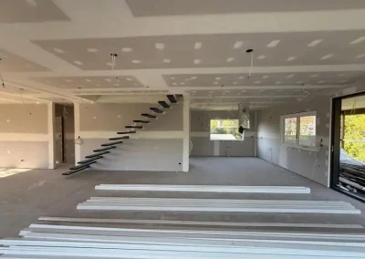 Plastering contractor work in Ashgrove with ceilings and walls sheeted ready for stopping