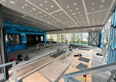 Suspended ceiling installation in Manly with an exterior alfresco area framed ahead of fit-out